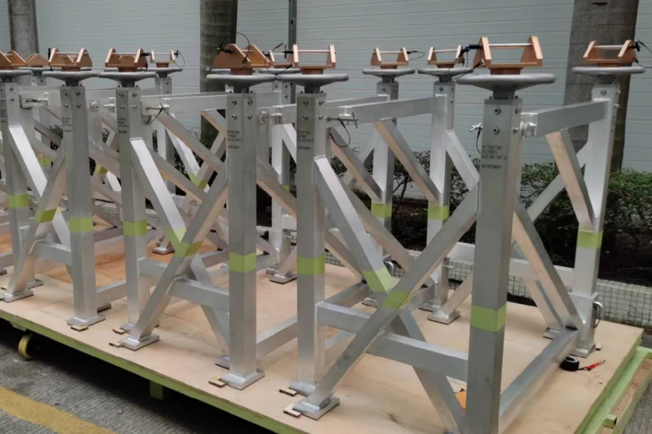 Custom-engineered Boeing 747 passenger-to-freighter (P2F) conversion tooling system and shoring stanchions ready for deployment.
