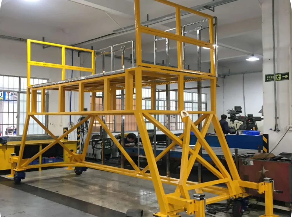 Wide-angle interior view of KiyeMech's ISO 9001 certified 3,700㎡ aviation GSE and MRO docking platforms manufacturing facility in Guangzhou, China.
